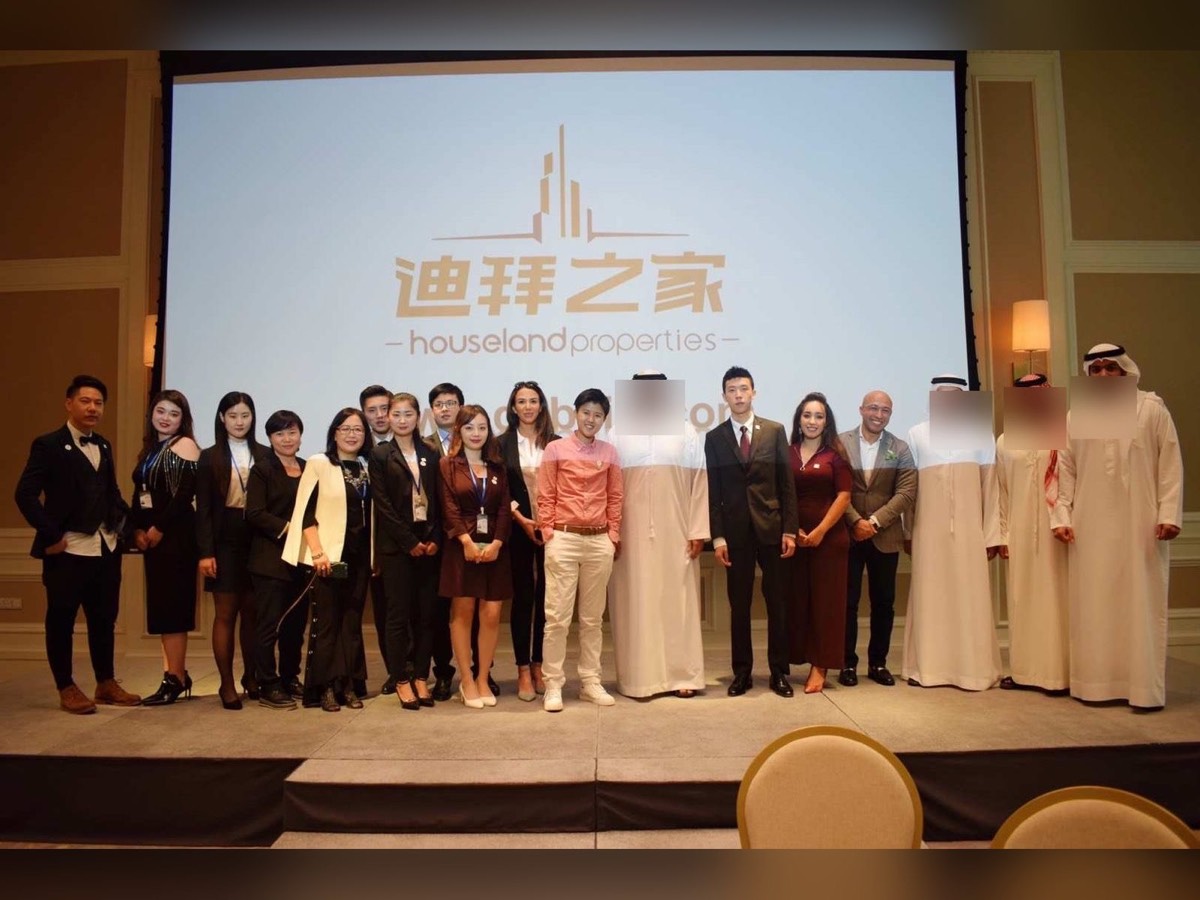 Founder’s Dubai brokerage team on stage with Emirati business partners