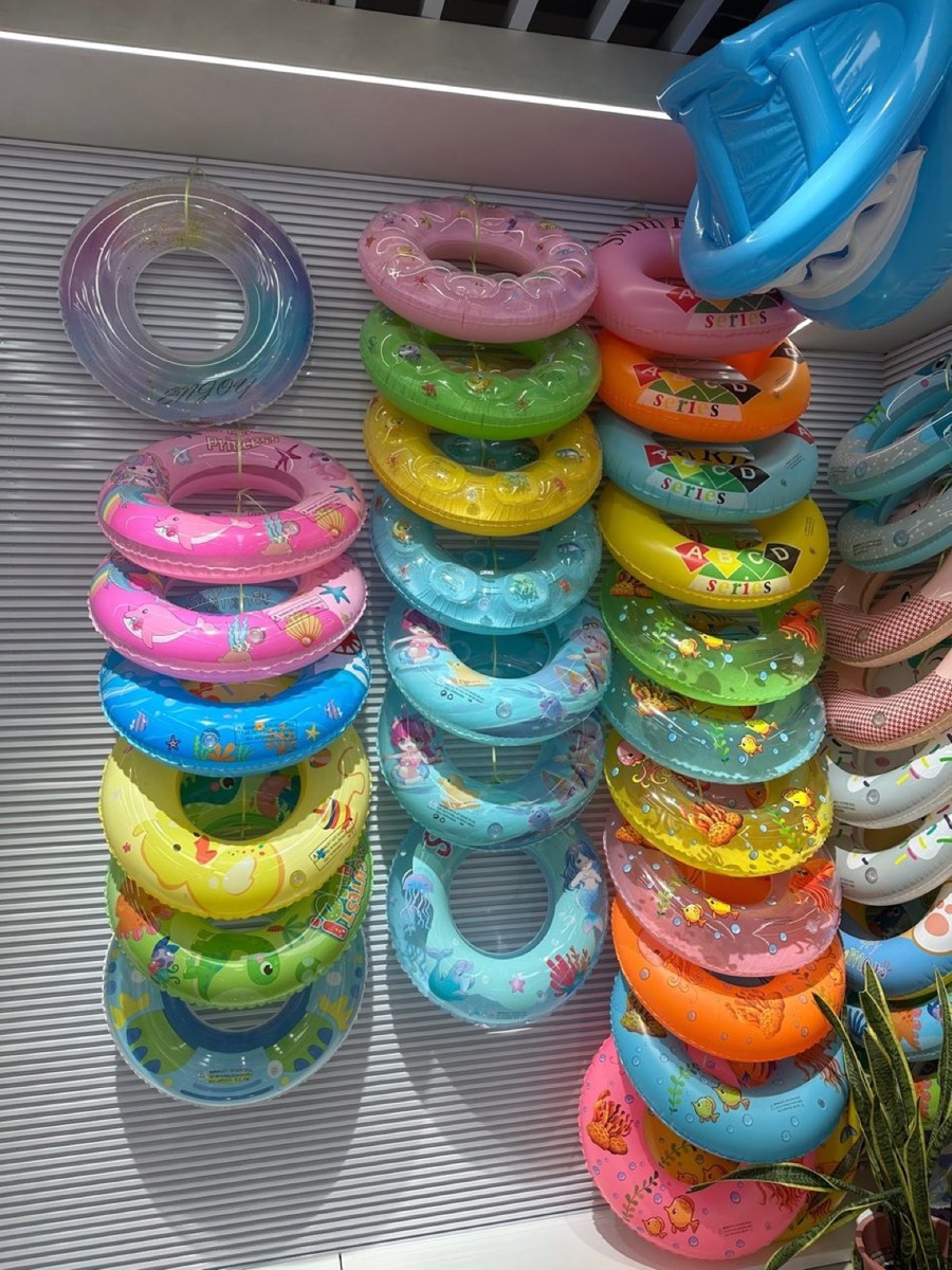 Yiwu market stall with seasonal inflatables and summer products