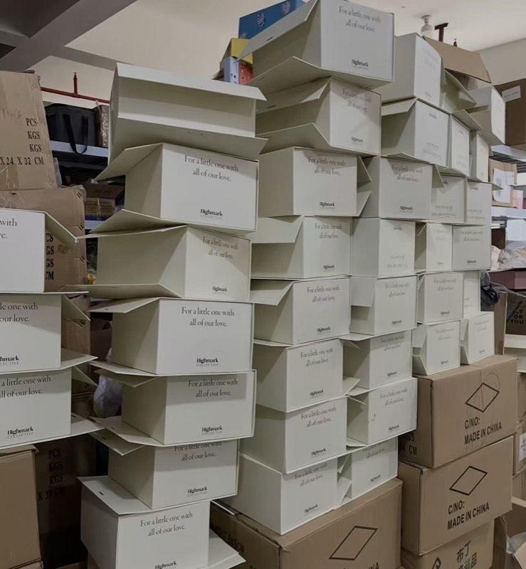 White boxes stacked in warehouse